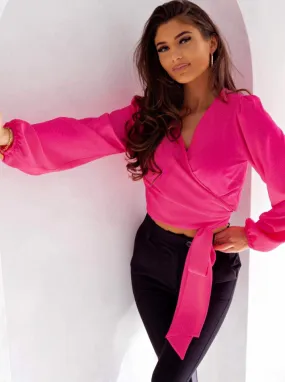 Blusa fucsia a manica lunga con scollo a V sovrapposto allacciabile in vita