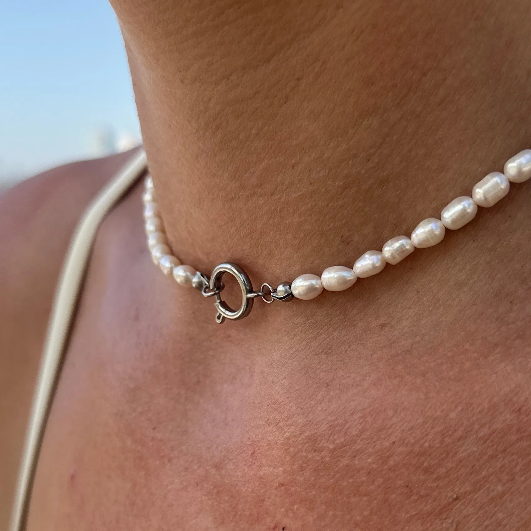 Pearl necklace with a silver clasp